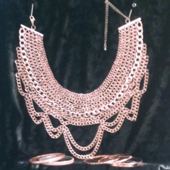 Copper tone statement necklace and bangle bracelets. - Picture 2 of 7